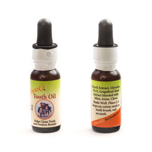 Snook's Tooth Oil 1/2oz bottle, front and back of bottle.